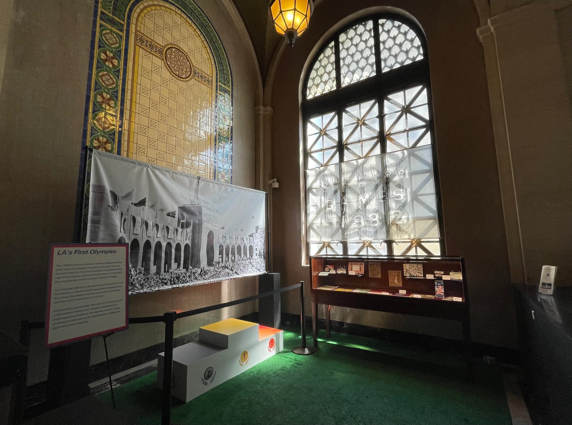 1932 Olympic memorabilia and photos stuck behind a counter in LA's city hall