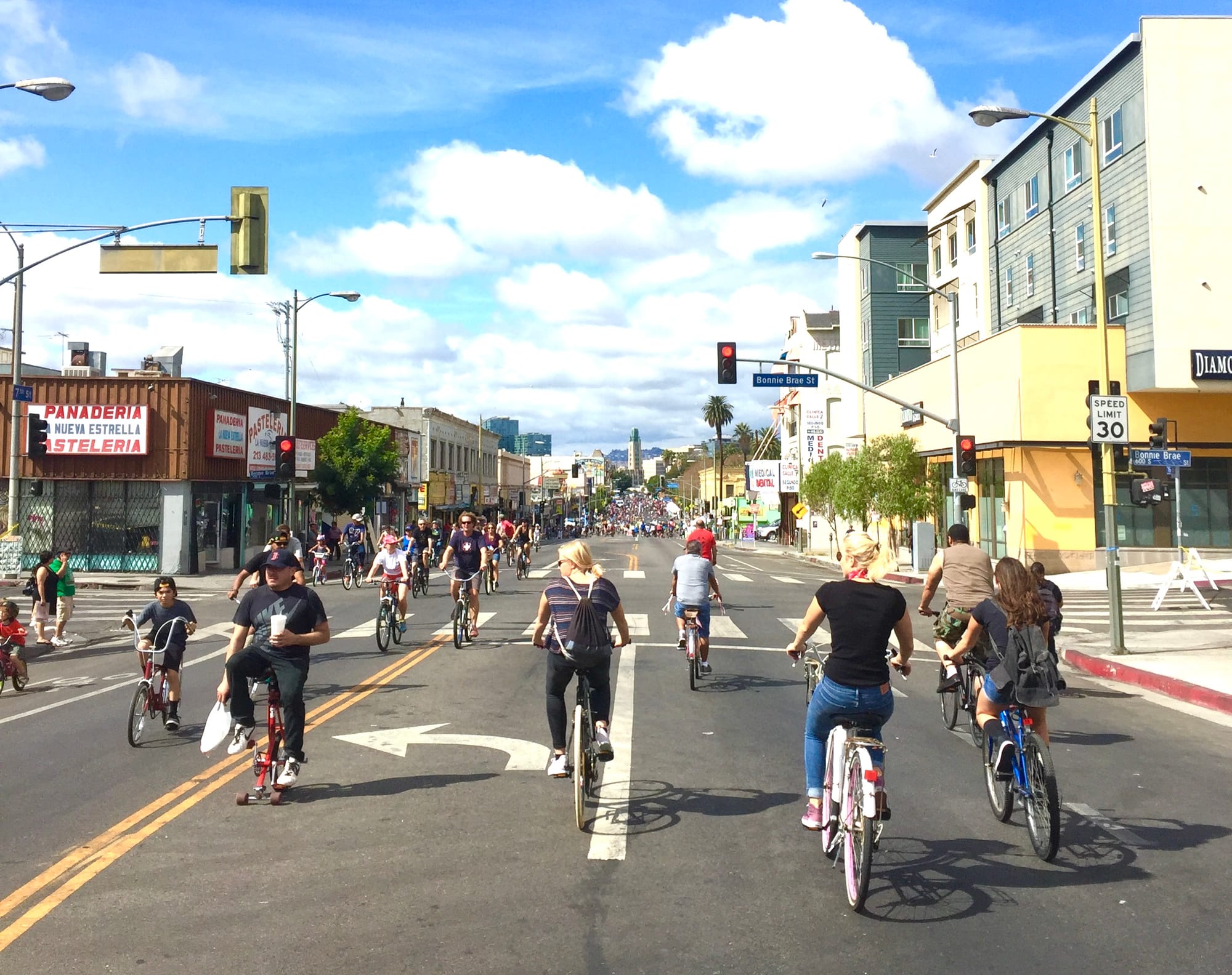 People biking and walking down 7th Street in LA as part of CicLAvia open streets event