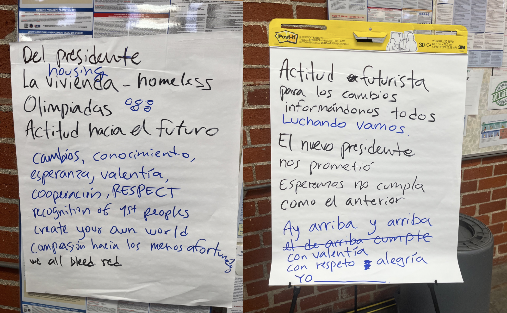 Words jotted on two large notepads about the Olympics and Trump, including del presidente, la vivienda, olimpiadas, actitud hacia el futuro, with the words forming lyrics to a song